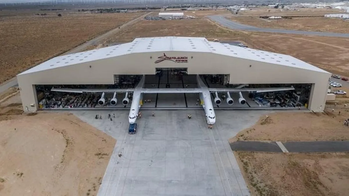 Stratolaunch carrier aircraft outside a Mojave hangar